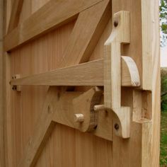 a close up of a wooden door handle