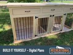 a dog kennel in the grass with its doors open