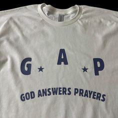 a white t - shirt with the words gap on it