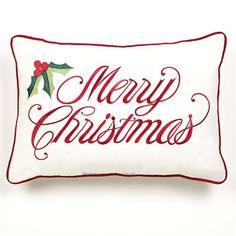 a white pillow with merry christmas lettering on it