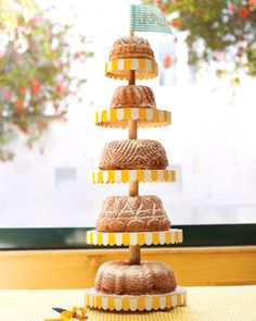 there is a cake tower made out of donuts