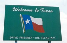 a welcome sign to texas with the flag on it's back and words that read, drive friendly - the texas way