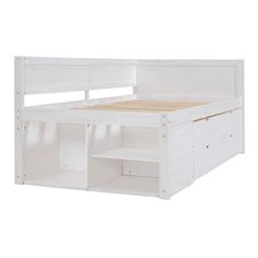 a white bed with drawers underneath it