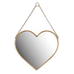 a heart shaped mirror hanging on a chain