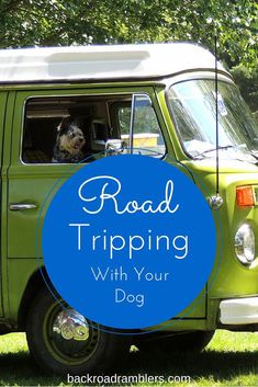 a green van with the words road tripping with your dog