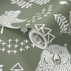 a green and white wallpaper with bear, bear and leaves on it's side