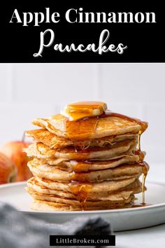 stack of apple cinnamon pancakes on a plate with syrup drizzled over them