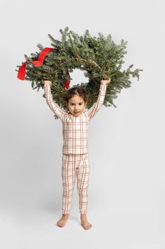 Just in time for the holidays, there’s nothing more classic than plaid pajamas during the winter. Modernized with an allover "Merry & Bright" script, this pajama toddler set is cozy & gender neutral, too. Made with an organic cotton blend, the matching top and bottom combo is designed for kids ages 2-6. Print is also available in infant zipper one-piece for sibling matching. FEATURES 2-piece set includes: top & pants Top: crewneck, long sleeves, ribbed cuffs & neckline Pants: elastic waistband a Toddler Christmas Pictures, Family Xmas Pjs, Cute Christmas Pajamas, Holidays With Toddlers, Santa Pajamas, Xmas Pjs, Christmas Campaign, Santa Photos, Santa Outfit