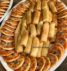 there are many different types of food on this platter, but it looks like they were made from bread