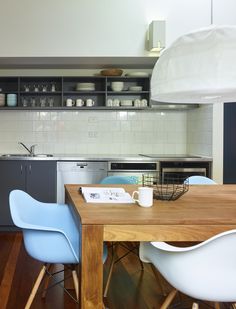 the kitchen is clean and ready to be used as a dining room or office space