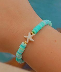 Beautiful handmade bracelet made with stretchy cord and clay beads.  Starfish with turquoise clay beads Make Clay Beads, Music Bracelet, Bracelet Business, Clay Bracelets, Clay Bead Bracelet, Bracelets Ideas, Clay Bracelet, Beads Bracelet Design, Clay Bead