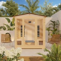 an outdoor sauna is shown with two chairs and potted plants in the background