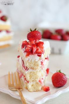 a piece of cake with strawberries on top