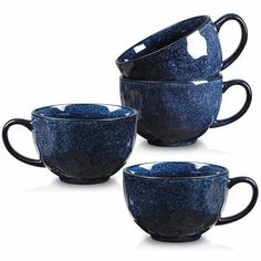 three blue coffee mugs sitting next to each other