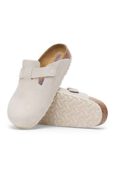 The perfect shoe for all seasons, these Birkenstock Boston Soft Footbed Clogs in Antique White are ones you will never get tired of. Arch support, soft foam layer, and a clog design are some of the features that make up this fashion staple footwear. Get yours for the upcoming seasons! Features: Birkenstock Style: 1027693 Color: Antique White Signature clog design Narrow fit Soft Footbed Suede footbed lining and upper Natural leather insole EVA outsole Cork footbed Arch support Adjustable strap with metal buckle Birkenstock branded logo on inner shaft, footbed, and buckle European sizing Imported Want some more information about the must have casual shoe? Check Out our Blog! White Boston Birkenstock, White Birks, Birkenstock Boston Soft Footbed, Boston Soft Footbed, White Birkenstocks, Clogs For Women, Birkenstock Style, Trendy Shoes Sneakers