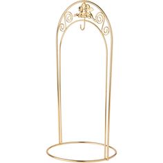 a gold metal rack with an ornate design