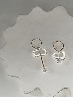 Landform Earring 11 – Marida Jewelry Chic Teardrop Sterling Silver Jewelry, Sterling Silver Single Hoop Earring For Party, Small Hoop Sterling Silver Earrings For Party, Minimalist Clip-on Earrings As Gift, Party Earrings With Clear Metal, Elegant Cartilage Earrings For Party, Modern Solo Round Earring, Minimalist Sterling Silver Hoop Earrings For Party, Trendy Handmade Clear Jewelry