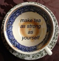 a blue and white cup with the words make tea as strong as yourself on it