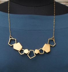 #Geometric #Necklace with #Gold Plated #Pentagons. Contemporary, Urban, #Boho, Trendy, For formal Occasions #JewelryByVita https://www.etsy.com/listing/237725034 Geometric Jewellery, Geometric Accessories, Urban Boho, Geo Design, Geometric Pendant Necklace, White Pearl Bracelet, Pink Palette, Handmade Jewelry Designs, Geometric Necklace