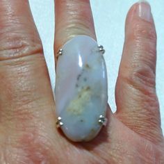 This Is A Beautiful, Handmade, Cocktail Sized, Pink Opal Ring In A Size 8. I Love It! It Is A Delicate Soft Colored Pink. The Dendrite Color Inclusions Are Almost 3d Because Of The Translucency Of The Stone. I Hope You Like It Too. The Silver Setting Makes This Ring Really Stand Out. Thanks For Stopping By And Feel Free To Leave Me A Fair Offer. :) Hp79887 Healing Rings With Natural Stones, Pink Opal Rings As A Gift, Elegant Opal Ring With Natural Stones, Opal Ring With Natural Stones As A Gift, Healing Moonstone Ring With Natural Stones, Silver Pink Opal Ring Gift, Silver Pink Opal Ring For Gift, Elegant Silver Rings With Pink Opal, Oval Silver Opal Ring With Detailed Stones