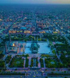 an aerial view of a city with lots of buildings