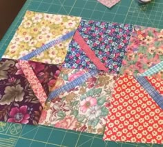 the quilts are laid out on the cutting board