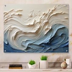 an abstract painting on the wall in a living room