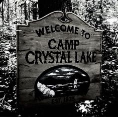 the welcome sign to camp crystal lake