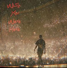 a man is walking in the rain with his handwritten wish you when he's gone