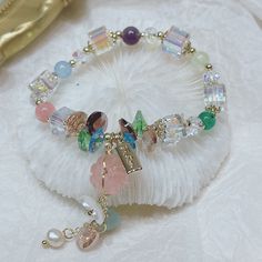 Unlock the Magic and Dreams of Summer with the Crystal Fairy Bracelet Are you looking for a magical accessory to help your daughter feel like a real-life fairy princess? The Dreamland Fairy Crystal Fairy Bracelet promises to make all her dreams come true and more! Crafted from beautiful crystals in an enchanting nature-inspired design, this bracelet is sure to be a conversation starter at any gathering. Keep that magical feeling alive with the Spring and Summer Crystal Fairy Bracelet – because e Fairy Style Adjustable Jewelry For Gifts, Multicolor Fairy Style Jewelry Gift, Fairy Style Multicolor Jewelry For Gifts, Fairy Style Multicolor Jewelry Gift, Multicolor Fairycore Jewelry For Gifts, Fairycore Multicolor Jewelry For Gifts, Adjustable Fairycore Bracelets As Gifts, Fairy Bracelet, Fairy Bracelets