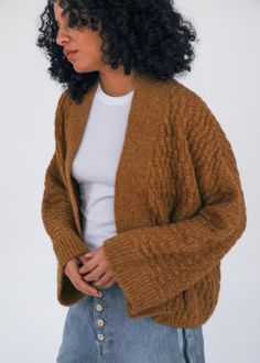 A hand-loomed kimono jacket with a box cut, complete with a belt. This is a favored shape in new weaves and colors for this fall/winter season. Hand knit in Peru for us using 70% baby alpaca, 7% merino, 23% recycled polyamide. We believe in Fair Trade and give priority to natural organic ecological materials produced in Peru under strict quality control guidelines respecting the environment. Vintage Indigo, Silk Shawl, Cozy Fits, Kimono Jacket, Baby Alpaca, Natural Organic, Quality Control, Winter Season, Cotton Silk