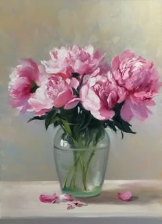 a painting of pink flowers in a glass vase on a table with petals scattered around