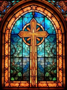 a stained glass window with a cross on it