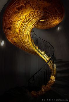 a spiral staircase in the middle of a building