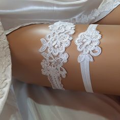 Ideal gift for bride fantasy object for valentine's day You can get this garter as a wedding gift to your friend White quality lace is used Please do not tighten or loosen when measuring. You must choose your exact size Only white color available from this lace,  but the elastic band can do other color If you want different color tape, please contact me Happy shopping White Garters, Lace Garter Set, Bridal Garters Set, Lace Garter, Wedding Garter Set, Garter Set, Bridal Garter, Wedding Garter, Stretch Lace