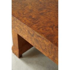 a close up of a wooden table with no one on it's legs or feet