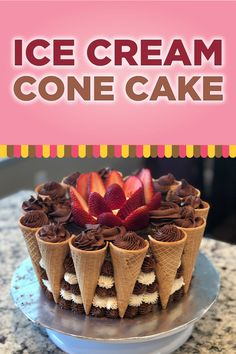 an ice cream cone cake with chocolate frosting and strawberries in cones on top