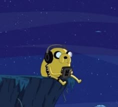 a cartoon character sitting on top of a cliff with headphones in his ears and looking at the sky