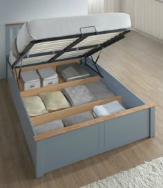 a bed that has been opened and is sitting on the floor