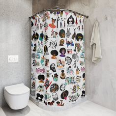 a white toilet sitting next to a shower curtain covered in stickers