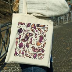 "This microbiology tote bag will be the perfect gift for the biologist, microbiologist, biology teacher, medical laboratory scientist, medical laboratory technician or technologist in your life. This design is available on other products, so check out my store! This 100% cotton bag comes in one size - 15\" x 16\"- perfect for everyday wear. The tote bag is durable and will last for years, it features 20\" handles (made from the same canvas), making it easy to carry even with a week's worth of shopping. .: 100% cotton canvas .: Heavy fabric (12 oz/yd² (406.9 g/m .: Sewn-in label The tote bag is printed on one side." Laboratory Gift Ideas, Biology Teacher Shirts, Microbiology Gifts, Biology Teacher Gifts, Biology Shirt, Scientist Lab, Medical Laboratory Technician, Laboratory Scientist, Medical Laboratory Scientist