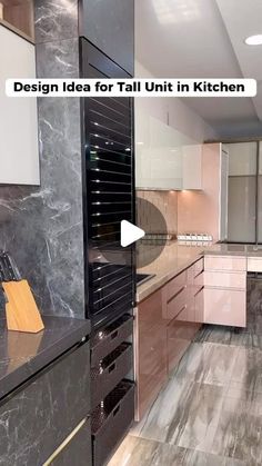 a kitchen with white cabinets and marble counter tops, along with a video player showing how to design idea for tall unit in kitchen