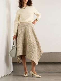 Bottega Veneta's skirt will add a touch of drama to your outfit, all while keeping you warm and cozy during the cooler months. It's knitted from soft wool patterned with checks and drapes effortlessly to a midi-length handkerchief hem. Portugal Clothes, Beige Skirt Outfit, Wool Midi Skirt, Floral Dresses Short, Dress Flats, Sports Skirts, Handkerchief Hem, Swimsuit Dress, Matthew Williamson