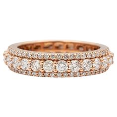 Gender: Ladies Metal Type: 10K Rose Gold Size: 10 Shank Maximum Width: 5.60 mm Weight: 6.36 grams Ladies 10K rose gold three-row diamond wedding eternity band with a half-round shank. Engraved with "10K". Pre-owned in excellent condition. Might shows minor signs of wear. Shared-Prong Set in 10 Karat Rose Gold with: 24 round brilliant cut natural diamonds: Measurements: 2.80mm - 2.85mm in diameter x ~1.72mm in depth. Weight Range: 0.080 ct. - 0.081 ct. Estimated Total Weight: 1.940 ct. Color: I - Rose Gold Wedding Band, Wedding Band Sets, Rose Gold Wedding, Diamond Wedding Band, Gold Wedding Band, Eternity Band, Eternity Bands, Round Brilliant Cut, Diamond Wedding Bands