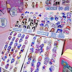 there are many stickers for sale in the store, including girls'hair clips