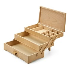 an open wooden box with drawers on the bottom and two compartments in the middle that are divided into sections