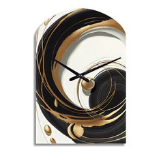 a black and white clock with gold swirls on the face, against a white background