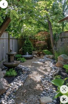 an outdoor garden with rocks and trees