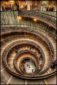 an overhead view of a spiral staircase in a building