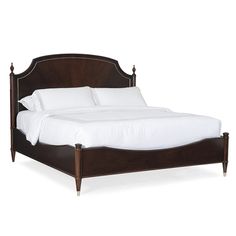 a wooden bed with white sheets and pillows on it's headboard, against a white background